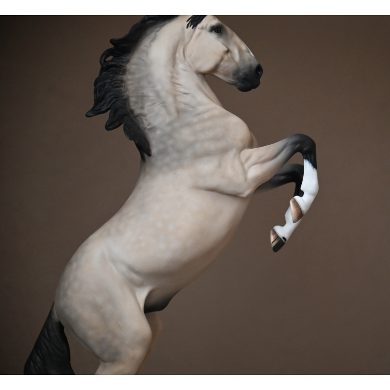 CM Breyer Adonis to a dappled buckskin