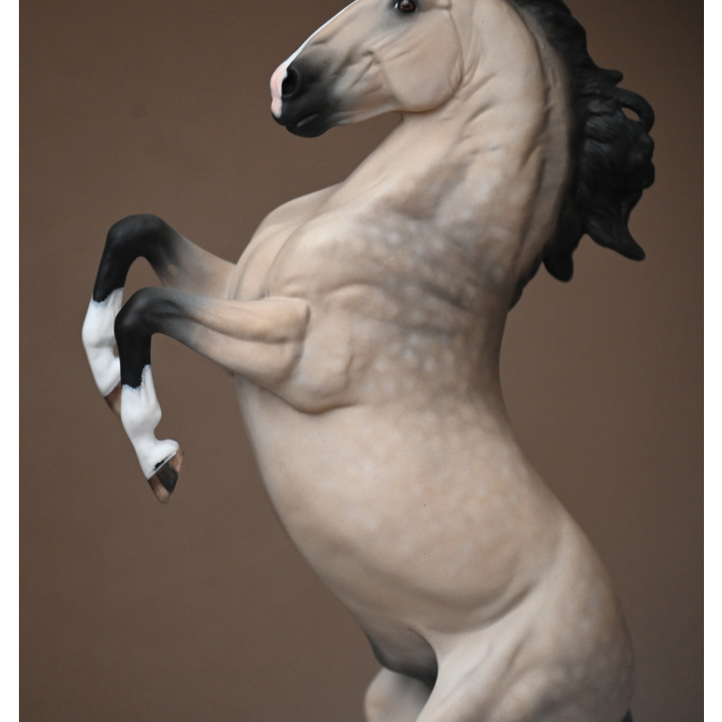 CM Breyer Adonis to a dappled buckskin