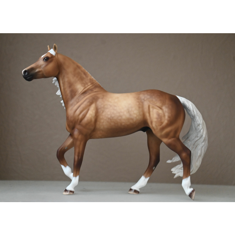 CM BREYER SMART CHIC OLEANA TO A SOOTY DAPPLED PALOMINO