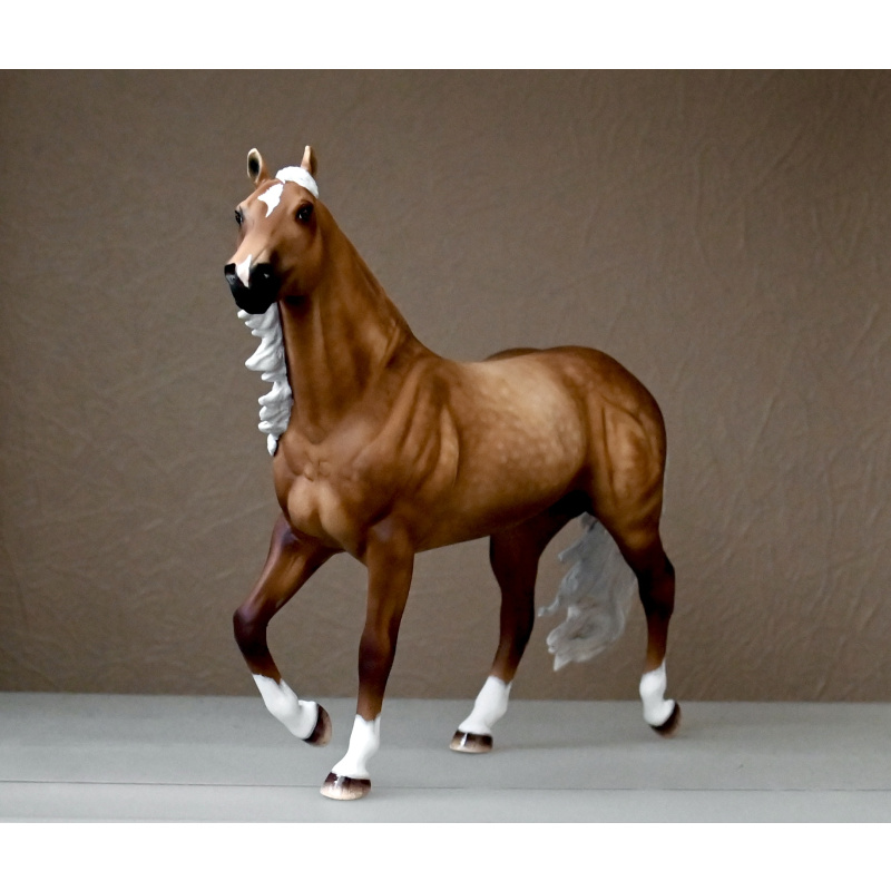 CM BREYER SMART CHIC OLEANA TO A SOOTY DAPPLED PALOMINO