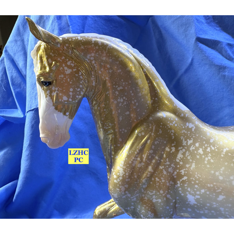 Breyer 2026 Scandi Surprise Model - Glossy gold decorator